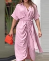 Detail view of pink button-down midi shirt dress featuring short sleeves and a waist tie - S / Pink