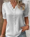 Detail of white hollow V-neck blouse with textured vertical pleats and lace trim details - Light Gray