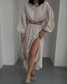 Detail of beige tie-waist long sleeve crop top and high slit maxi skirt two-piece set - S / Apricot