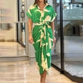 Close-up of green abstract print dress featuring lapel collar and waist tie detail - S / Green Flower