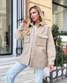 Detailed texture of women's oversized teddy fleece shacket with flap chest pockets - S / Apricot