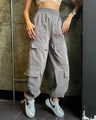 Detail of high-waisted light gray cargo pants featuring large utility side pockets - S / Gray