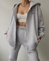 Detail of light grey hooded zipper tracksuit featuring soft cotton blend fabric and branding - S / Light Gray