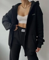 Detail of black fleece hoodie set with white ribbed crop top and gold chain necklace - S / Black