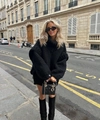 Close-up of black chunky knit oversized turtleneck sweater with high-quality texture - S / Black