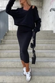 Dettaglio di un set casual nero a due pezzi con felpa corta e gonna a tubino midi elegante - Taglia S / Nero