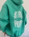 Detailed back view of mint green hoodie featuring white artistic circle letter print - S / Fruit Green