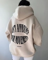 Detailed view of beige oversized hoodie with back letter print and ribbed texture - S / Khaki