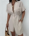 Detail of beige short sleeve cotton linen romper with elastic waist and side pockets - S / Apricot