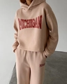 Detail view of beige casual tracksuit with red Michigan varsity print on hoodie and joggers - S / Apricot Pink