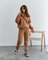 Detail of a brown two-piece fleece tracksuit with half-zip stand collar and ribbed cuffs - S / Dark Brown