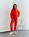 Detail of bright orange fleece tracksuit featuring half-zip stand collar and drawstring waist - S / Orange Red
