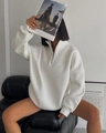 Detail view of white oversized half-zip sweatshirt with high collar and ribbed cuffs - S / White