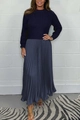 Close-up of the fine knit texture and elegant pleated satin fabric of the navy dress - Navy and Gray