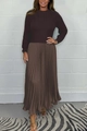 Detailed view of the dark brown knitted long sleeve top and pleated satin skirt combination - Brown