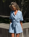 Detail of light blue short sleeve set with knot hem shirt and high waist casual shorts - S / Blue