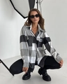 Detailed studio shot of a black and white plaid flannel shirt with a classic collar - S / Gray