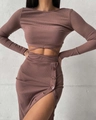 Detail of mauve ribbed knit set showing crop top waist ties and side button slit skirt - S / Brown