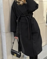 Detail shot of black wool coat with wide lapels and a functional waist tie closure - S / Black
