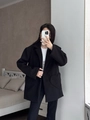 Detailed close-up of heart-shaped pockets on black wool coat for women in 2025 - S / Black