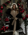 Detail of wool coat with faux shearling collar and cuffs in festive street style scene - S / Black Brown