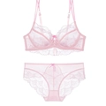 Detail view of light pink floral lace lingerie set with sheer embroidery and bow accents - 70A / Top And Bottom / Pink