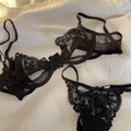 Sexy black floral lace lingerie set with sheer mesh bra and matching bow thong - Black