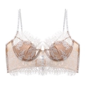 Detail of French lace bustier with floral embroidery, eyelash trim and decorative buttons - S / Nude