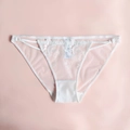 White lace lingerie with floral embroidery and adjustable thin straps in a low-rise fit - White