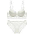 Completo intimo in pizzo bianco con reggiseno floreale e slip trasparente coordinato - Bianco / 70C