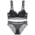 Completo intimo sexy in pizzo nero con reggiseno push-up e slip floreale trasparente - 70A / Nero