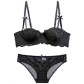 Ensemble lingerie sexy en dentelle noire style français avec détails nœuds sur fond blanc - Noir