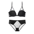 Detalle de conjunto de lencería de malla blanca y negra con tirantes finos y diseño moderno - 70A / Negro