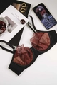 Detail of French lace patchwork bra featuring wine red mesh and adjustable straps - 75B / Red Black