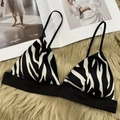 Bralette francese con stampa zebrata e spalline sottili su sfondo beige morbido - S / Zebra Print