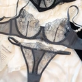 Detail of grey mesh bra set with rose floral embroidery and adjustable straps - Gray
