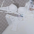 White push-up bra set with seamless multi-strap design and hollow lace-up details - 75B / White