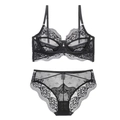 Detailed macro view of black eyelash lace bra and matching panties with scalloped edges - 70B / Black