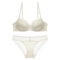 Dessous-Set aus champagnergoldener Spitze mit Satin-BH und Mesh-Slip auf weißem Hintergrund - 70A / Aprikose Set