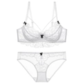 Conjunto de lencería de encaje blanco con sujetador con aros y lazos negros decorativos - 70A / Blanco