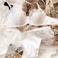Detail of white satin and eyelash lace bra set with delicate floral patterns and steel wire - S / White