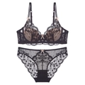 French lace lingerie set with floral patterns and bow details in black and beige - 70A / Black And Nude