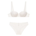 Flat lay of ivory push-up bra set featuring mesh paneling and contrast strap detailing - 75D / White