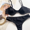 Detailed macro view of black textured mesh lingerie set with lace and straps - S / Top And Bottom / Black