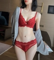 Detail of red lace lingerie set featuring delicate embroidery and sheer mesh texture - 70B / Burgundy