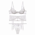 Detail view of white floral lace lingerie set with mesh embroidery and satin bows - S / White