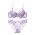 Detailed view of light purple lace lingerie set with strappy cross-chest design and mesh - Purple