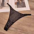 Elegant black satin G-string for women with adjustable straps on a wooden background - M / Black
