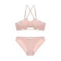Detail of dusty pink lingerie set featuring halter neck and lace-up cutout design - M / Pink