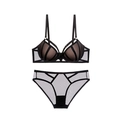 Set lingerie in pizzo nero con reggiseno push-up e slip in mesh coordinati - 70A / Nudo